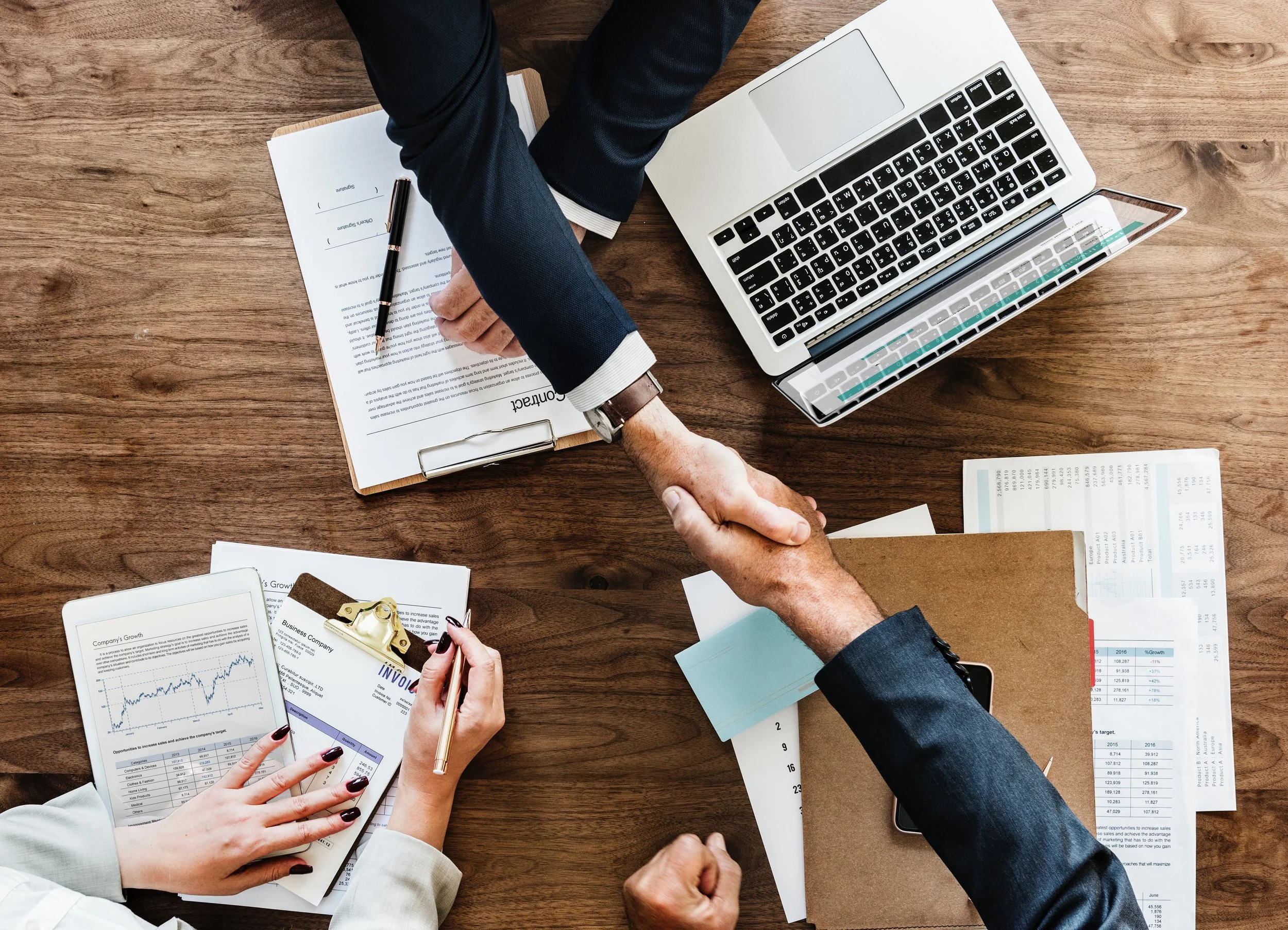 attachment-5cc70df3f9619a15878e4622 agreement business businessman