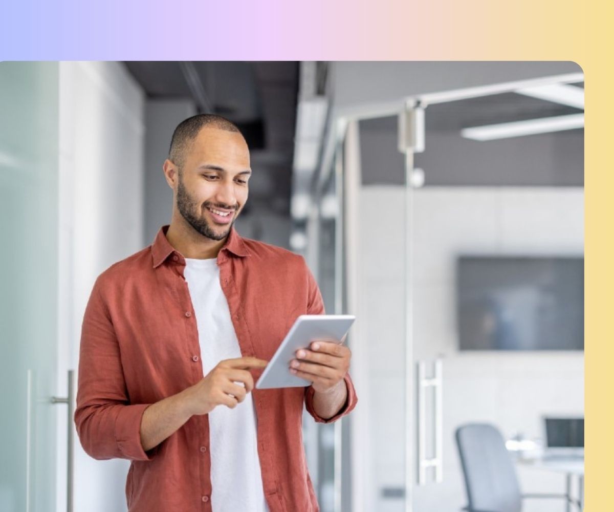 Man looking at tablet